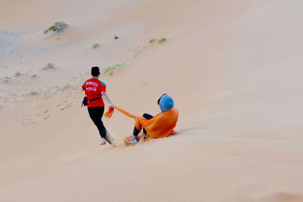 Travelers with local guide in Morocco – Uncovered Trails Morocco Tour Company