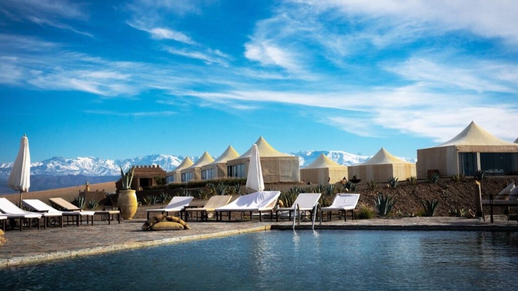 Agafay Desert landscape with luxury camp near Marrakech.